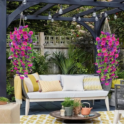 Outdoor seating area with a pergola, flowers, and a small table with decor items.