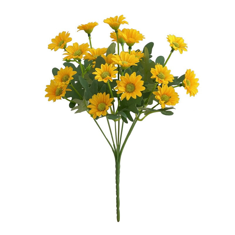 Bouquet of yellow flowers with green leaves on a white background